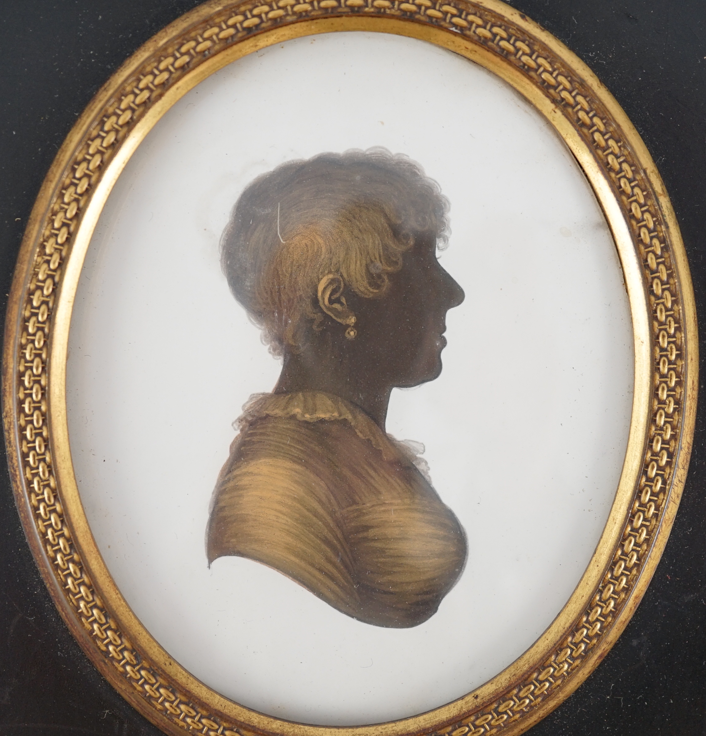 John Miers (1752-1821), Silhouette of the Countess of Clarendon, painted and bronzed plaster, 8 x 6.5cm.